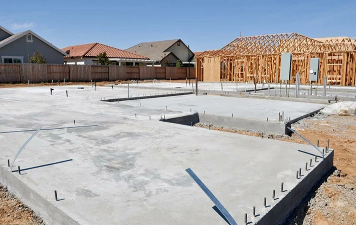 Concrete slab foundation for a new home under construction, relevant to slab foundation repair.
